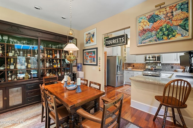 211 S 2nd St, Wilmington, NC 28401 - dining room with light wood finished floors