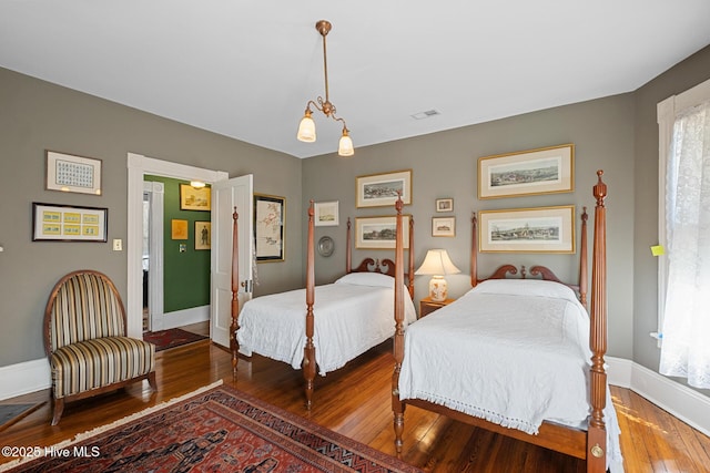 211 S 2nd St, Wilmington, NC 28401 - bedroom featuring wood-type flooring and baseboards