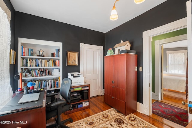 211 S 2nd St, Wilmington, NC 28401 - home office featuring wood finished floors and baseboards
