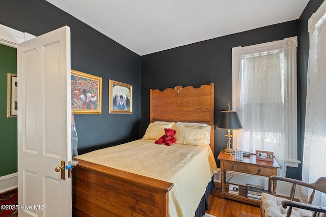 211 S 2nd St, Wilmington, NC 28401 - bedroom featuring wood finished floors and baseboards