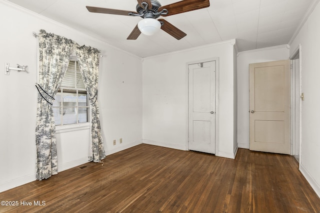 2109 Arendell St, Morehead City, NC 28557 - unfurnished bedroom with wood-type flooring, crown molding, baseboards, and ceiling fan