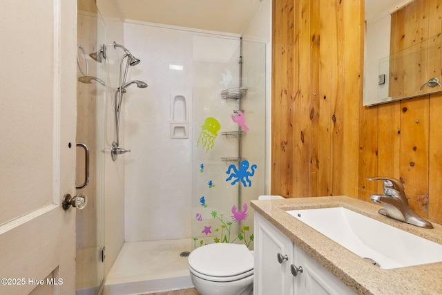 2109 Arendell St, Morehead City, NC 28557 - bathroom featuring a stall shower, toilet, and vanity