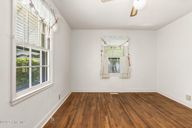 2109 Arendell St, Morehead City, NC 28557 - unfurnished room with wood-type flooring, a ceiling fan, and baseboards