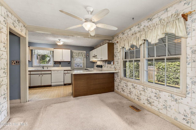 2109 Arendell St, Morehead City, NC 28557 - kitchen with white dishwasher, range with electric cooktop, wallpapered walls, ornamental molding, and a sink
