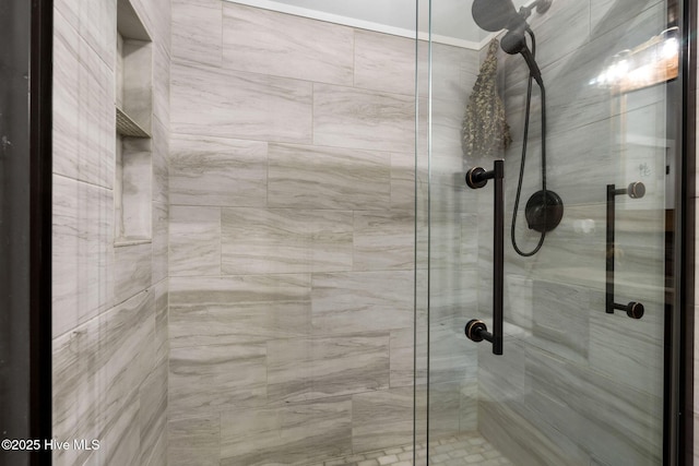 bathroom with a shower stall