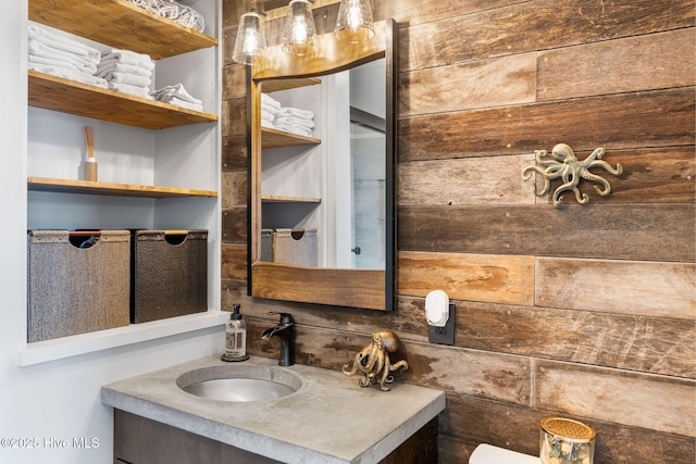 half bath featuring vanity