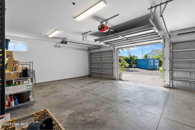 garage featuring a garage door opener