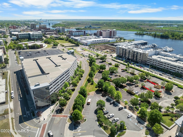 aerial view with a water view and a view of city