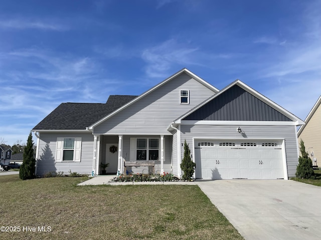 craftsman house with concrete driveway, a front lawn, covered porch, and a garage