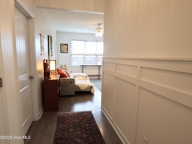 hallway featuring dark wood-style floors