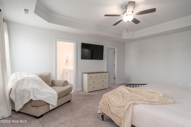bedroom featuring crown molding, light carpet, a tray ceiling, baseboards, and visible vents