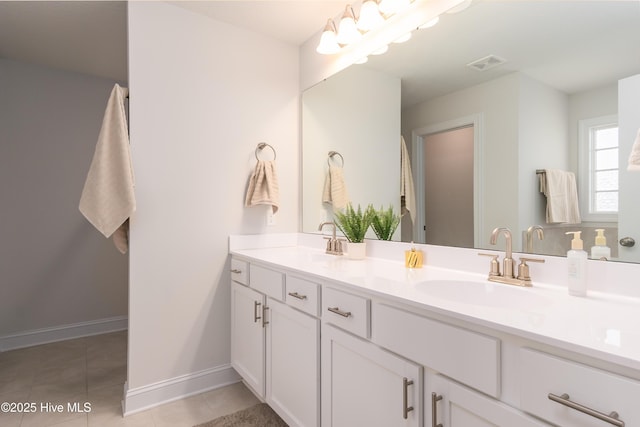 full bath with tile patterned flooring, visible vents, a sink, and double vanity