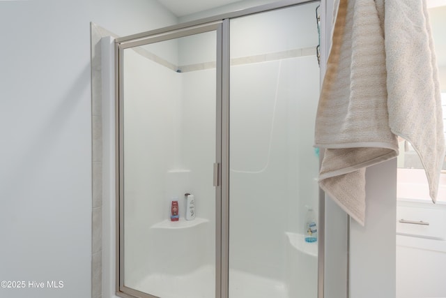 full bathroom with a shower stall