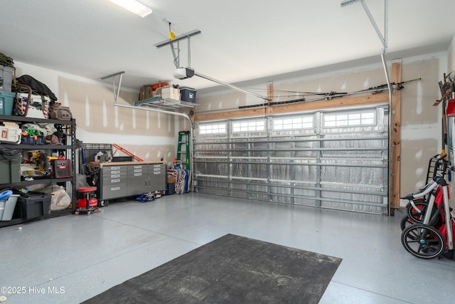 garage featuring a garage door opener