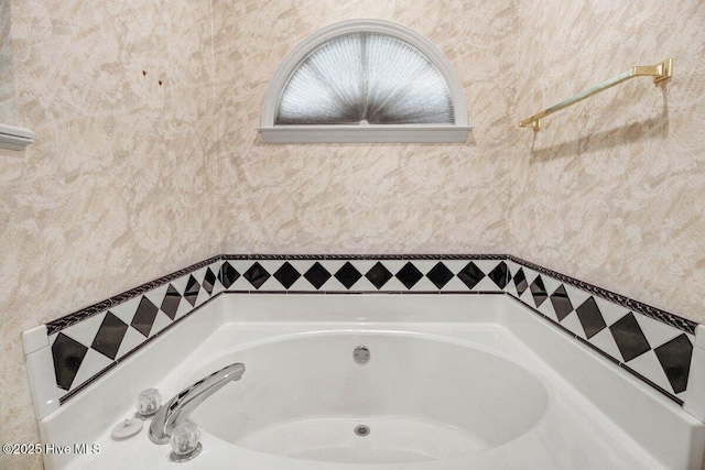 bathroom featuring a bath
