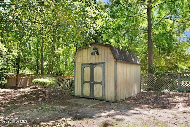 view of shed featuring a fenced backyard