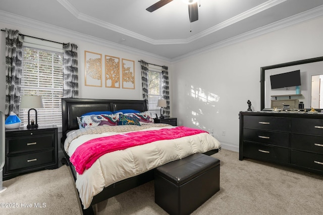 bedroom with light carpet, baseboards, ornamental molding, and ceiling fan