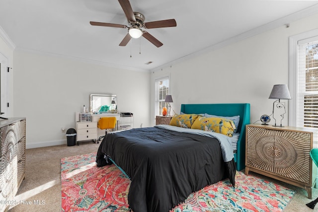 bedroom featuring carpet flooring, multiple windows, and crown molding
