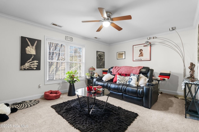 living area with carpet flooring, visible vents, a ceiling fan, and ornamental molding