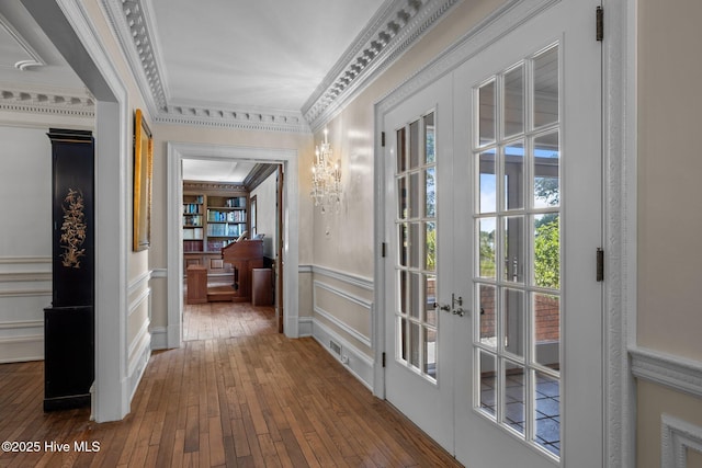130 Harbour Dr, Hubert, NC 28539 - hall with a decorative wall, hardwood / wood-style flooring, crown molding, and a wainscoted wall