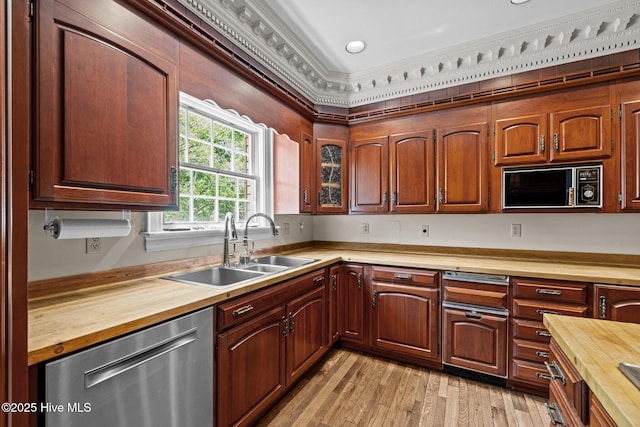 130 Harbour Dr, Hubert, NC 28539 - kitchen featuring butcher block counters, dishwasher, a sink, and light wood-style floors