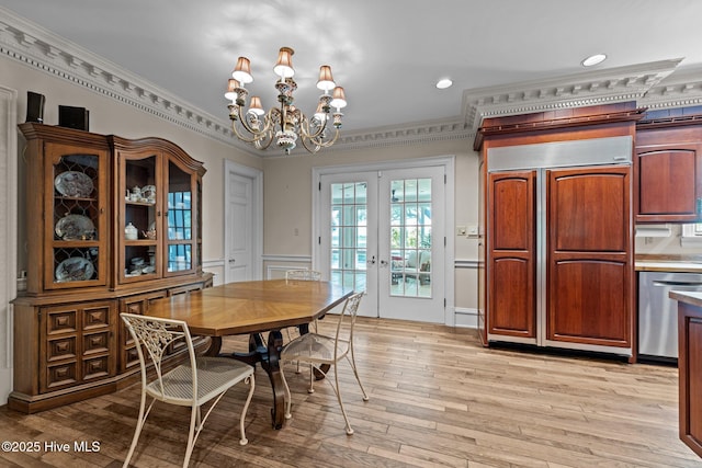 130 Harbour Dr, Hubert, NC 28539 - dining area featuring french doors, a chandelier, crown molding, light wood-type flooring, and recessed lighting