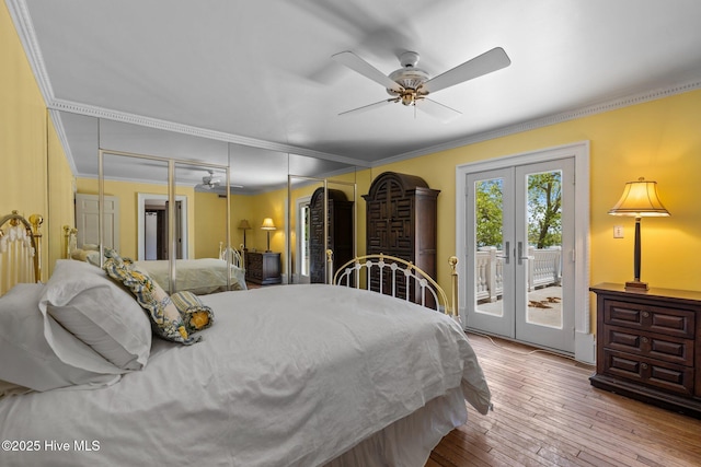 130 Harbour Dr, Hubert, NC 28539 - bedroom with access to exterior, french doors, crown molding, hardwood / wood-style flooring, and a ceiling fan
