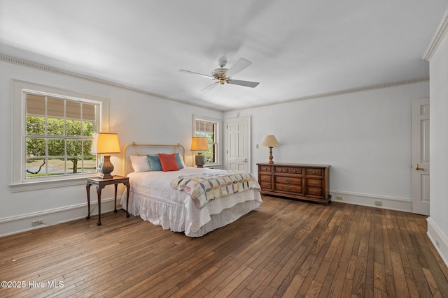 130 Harbour Dr, Hubert, NC 28539 - bedroom featuring hardwood / wood-style floors, crown molding, baseboards, and a ceiling fan