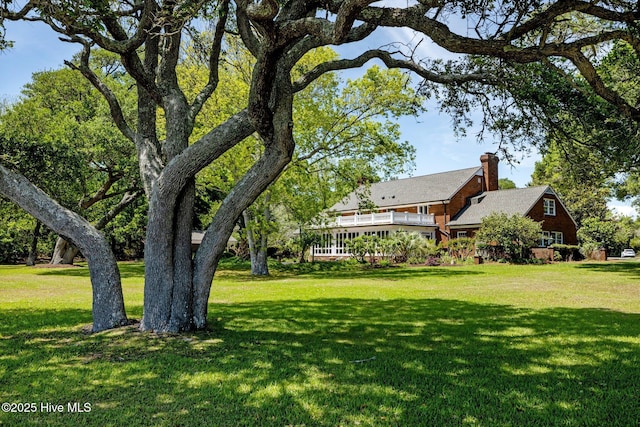 130 Harbour Dr, Hubert, NC 28539 - view of green lawn featuring a wooden deck