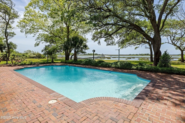 130 Harbour Dr, Hubert, NC 28539 - swimming pool with a water view and a patio area
