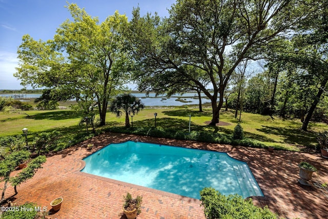 130 Harbour Dr, Hubert, NC 28539 - outdoor pool featuring a water view, a yard, and a patio