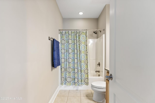 bathroom with tile patterned floors, shower / bath combo, baseboards, and toilet