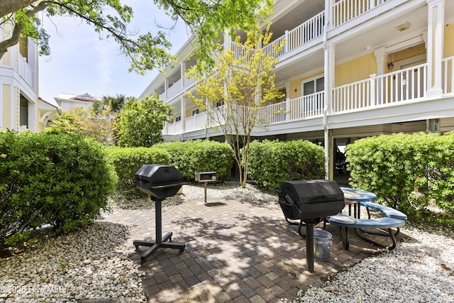view of home's community featuring a patio
