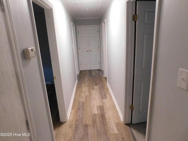 17261 Harvell Ln, Laurinburg, NC 28352 - hall with attic access, light wood-type flooring, and baseboards