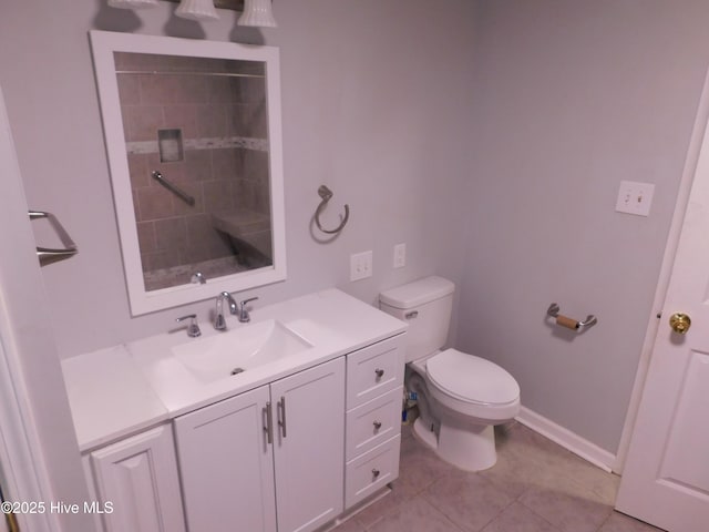 17261 Harvell Ln, Laurinburg, NC 28352 - bathroom featuring toilet, tile patterned floors, vanity, baseboards, and tiled shower