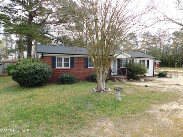 17261 Harvell Ln, Laurinburg, NC 28352 - single story home with crawl space, brick siding, and a front lawn