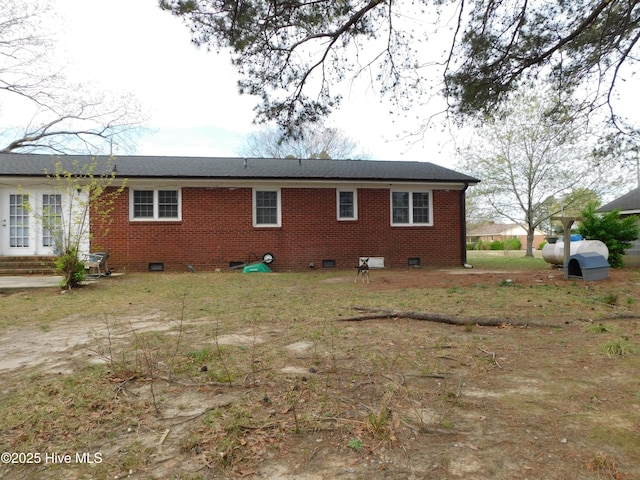 17261 Harvell Ln, Laurinburg, NC 28352 - back of house with crawl space and brick siding