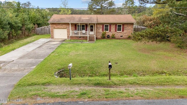 ranch-style house featuring an attached garage, covered porch, crawl space, and brick siding