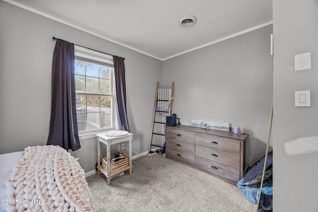 bedroom with baseboards, visible vents, ornamental molding, and carpet