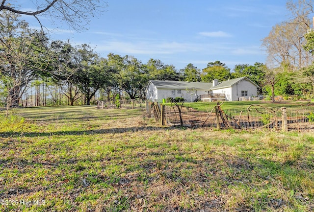 view of yard featuring fence