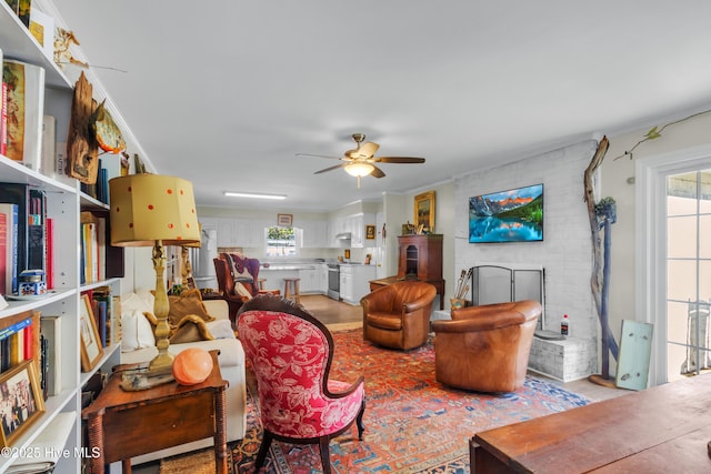 living room with a ceiling fan