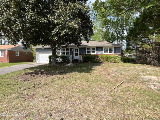 510 Sioux Dr, Jacksonville, NC 28540 - ranch-style home with driveway, a front yard, and a garage