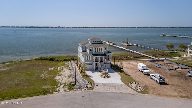 birds eye view of property featuring a water view