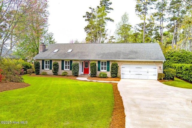 511 Pine Valley Dr, Morehead City, NC 28557 - view of front facade featuring driveway, a chimney, a front lawn, an attached garage, and brick siding