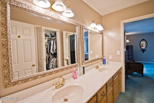 511 Pine Valley Dr, Morehead City, NC 28557 - full bath with double vanity and a walk in closet