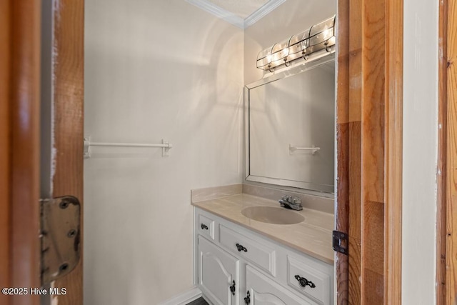 bathroom featuring vanity and ornamental molding