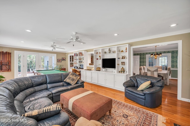 living room with crown molding, a chandelier, light wood-style flooring, recessed lighting, and billiards