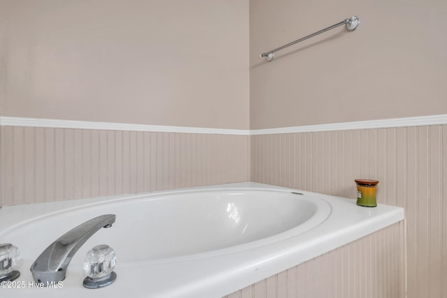 full bathroom featuring a bath
