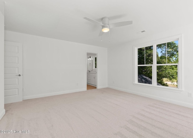 341 Mccabe Rd, Morehead City, NC 28557 - unfurnished room featuring light carpet, baseboards, and ceiling fan