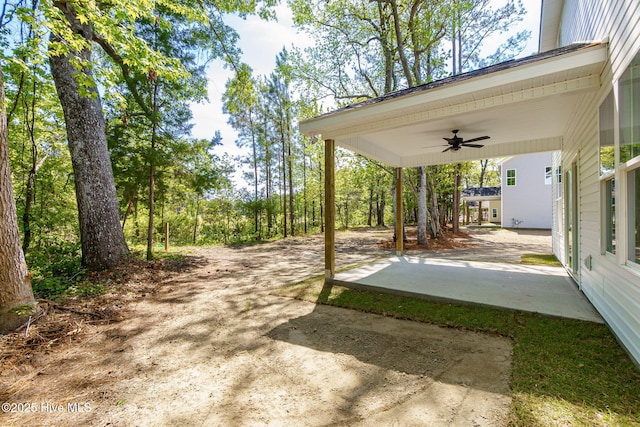 341 Mccabe Rd, Morehead City, NC 28557 - view of yard with a ceiling fan and a patio area